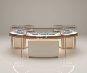 ### 英文(独立站商品正文,地道外贸商用文案) Curved enclosed glass island showcase for jewelry features champagne gold metal frames paired with ultra-clear shatterproof glass. Its curved surrounding layout maximizes display space. Equipped with drawers, the matte off-white storage cabinet is supported by slim metal legs for an elegant luxury look. Built-in warm LED strip lights highlight jewelry texture ideally. Perfect for store center placement in jewelry boutiques and luxury accessory counters, custom sizes & colors are available.